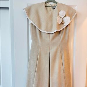 Elegant Vintage Beige Dress with Floral Accent